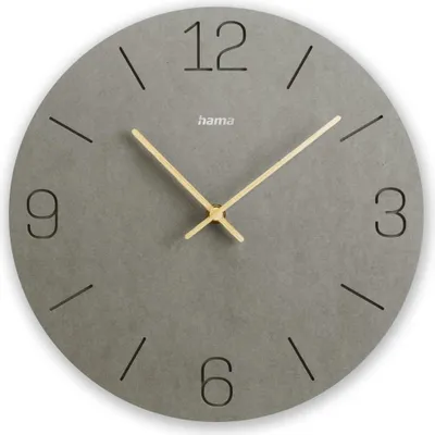 A close-up view of a gray analog wall clock with gold hands and black numbers.