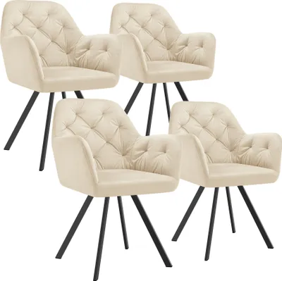 A group of four cream-colored upholstered chairs.
