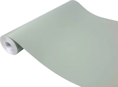A roll of pale green matte self-adhesive film for furniture.