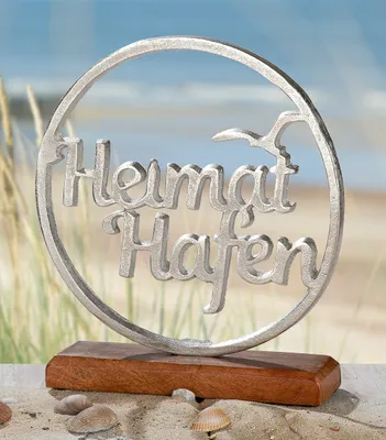 Immagine prodotto di Gilde Standrelief, rund, "Heimathafen", Möwenmotiv, Schriftzug, Aluminium, Mangoholz, silberfarben, VE 4, L. 5 cm, B. 22 cm, H. 25 cm 41293 4063387412930