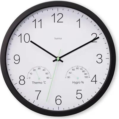 A wall clock with integrated thermometer and hygrometer.