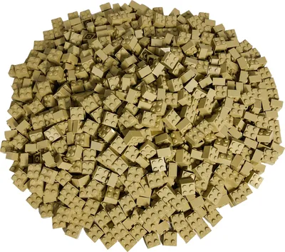 A pile of small, beige LEGO bricks.