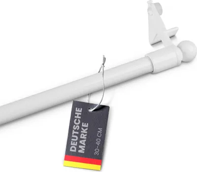 A white curtain rod with a tag attached.