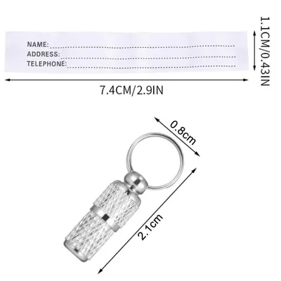 A product image showing a paper insert and a metal keychain with a capsule.