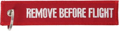 Produktbild von Anhänger mit Schriftzug Remove before flight ca. 13 x 2,8 cm