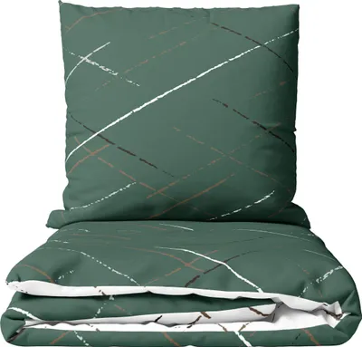 A folded duvet and a pillow with a green background and a striped pattern.