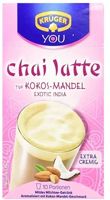 A product shot of a box of Krüger You Chai Latte, featuring a glass of the beverage and ingredients.