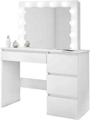 A white vanity table with a mirror and lights.