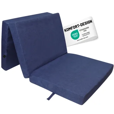 A folded blue mattress on a white background.