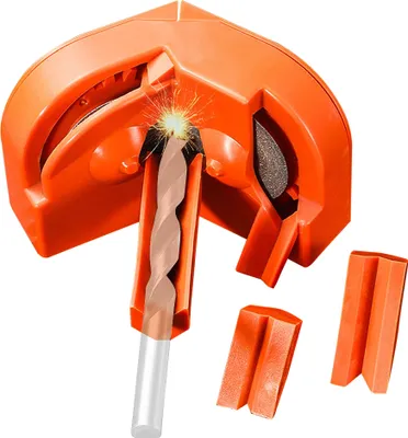 A close-up, angled view of an orange drill bit sharpener with a drill bit inserted, showing sparks flying.