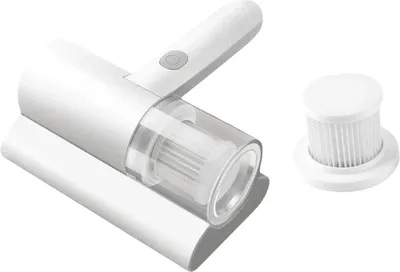 A white portable vacuum cleaner and a spare filter are shown on a white background.