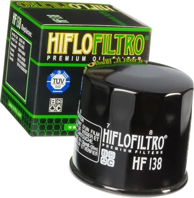 A black oil filter and its packaging are displayed against a white background.
