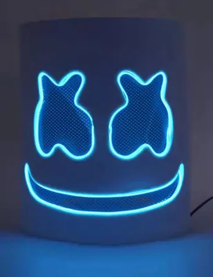 A close-up of a white mask with blue LED lights forming eyes and a smile.
