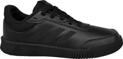 A black Adidas shoe is shown from the side against a white background.