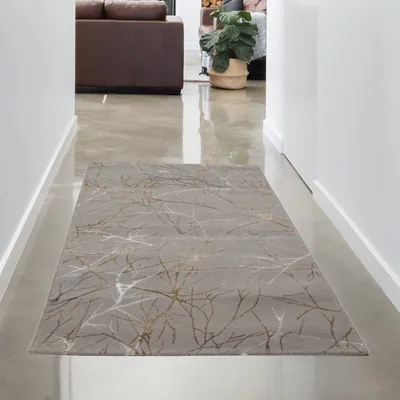 Produktbild von Moderner Designerteppich mit glänzenden Ästen abstrakt gold Größe - 80 x 150 cm