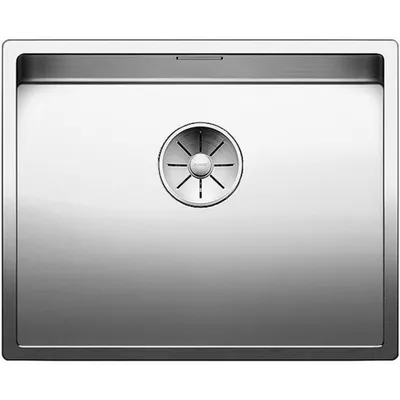 A top-down view of a stainless steel kitchen sink with a drain assembly in the center.