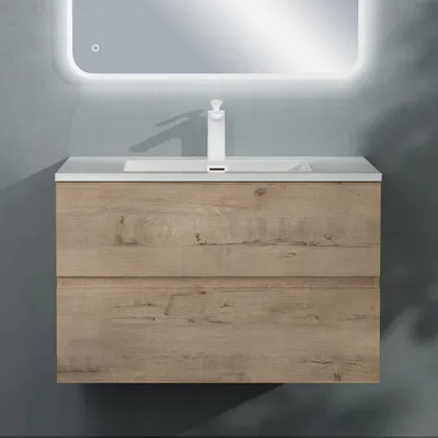 A modern bathroom vanity with a sink and faucet, mounted on a gray wall.