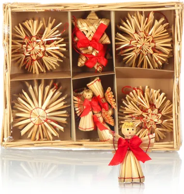 A set of straw Christmas ornaments in a divided box.