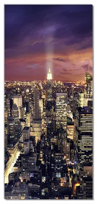Produktbild von Wallario selbstklebende Türtapete 93 x 205 cm - New York bei Nacht - Panoramablick über die Stadt - Abwischbar, rückstandsfrei zu entfernen