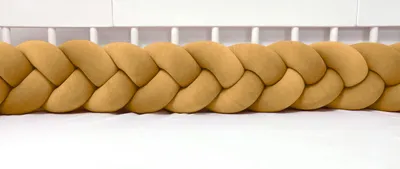 Produktbild von Bettschlange geflochten Velours 400 cm – Ocker | Bettumrandung Babybett Nestchen | Letino