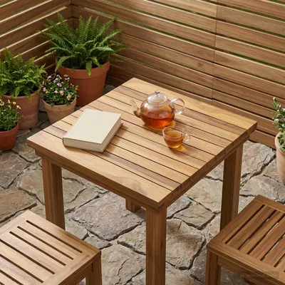 Immagine prodotto di Piano del tavolo: 40 x 40 x 3,5 cm. Forma: quadrato. Materiale: legno di teak massello