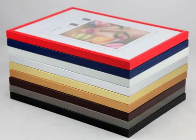 A stack of picture frames in various colors.