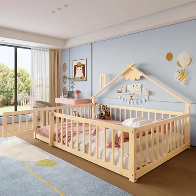 A child's bedroom with a wooden bed frame and a large window.