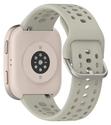 The back of a smartwatch with a beige casing and a gray perforated silicone strap is shown against a white background.