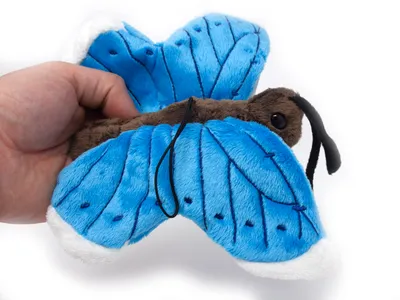 Produktbild von Cornelissen - Kuscheltier - Schmetterling mit Band (blau) - 23 cm