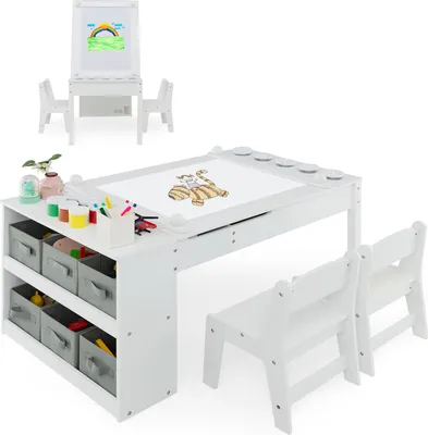 A white wooden children's activity table with an easel and chairs, set against a white background.