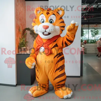 Produktbild von Orange REDBROKOLY Tiger Maskottchen Kostüm Charakter gekleidet mit einem Wickelkleid und Haarnadeln