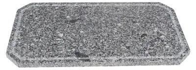 A rectangular granite grill stone with beveled edges, shown from a slightly elevated angle against a white background.
