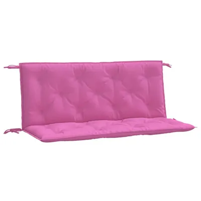 A pink cushion for a garden bench.