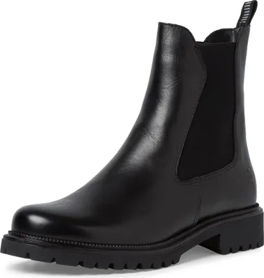 A black leather Chelsea boot with a lug sole is shown against a white background.