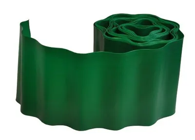 A roll of dark green garden edging with a scalloped edge.
