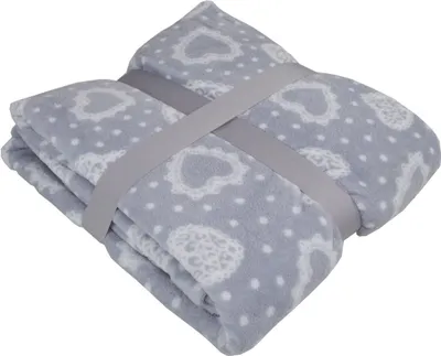 A folded gray blanket with a white heart pattern, secured by a gray band.