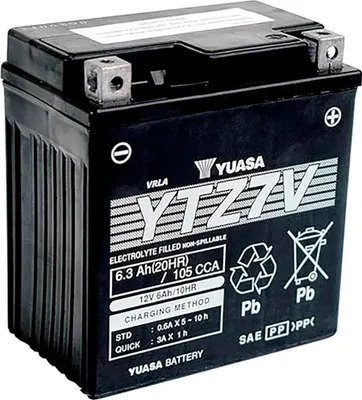 A black battery with labels and markings.