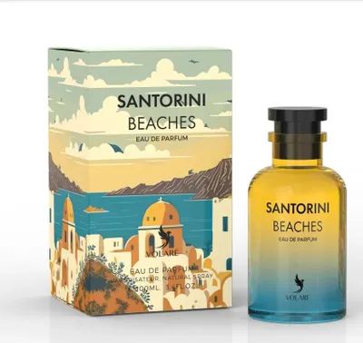 A perfume bottle and its box, both featuring a Santorini-themed design.