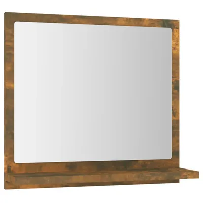 A mirror with a shelf attached, against a white background.