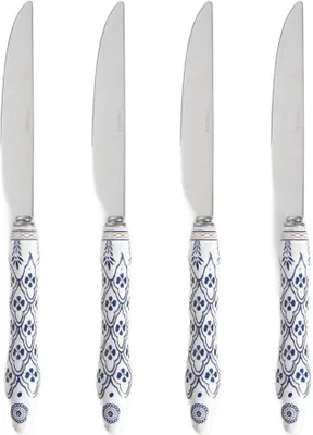 Four silver knives with decorative blue and white handles are arranged side-by-side against a white background.