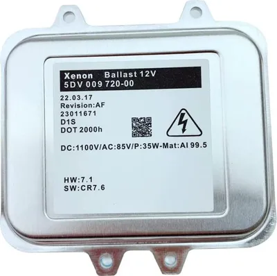 A close-up studio shot of a silver ballast unit with a label displaying technical specifications.