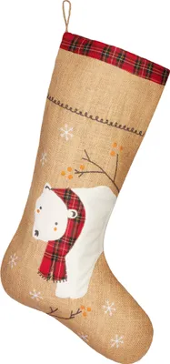 A Christmas stocking with a polar bear design.