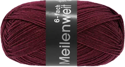 A ball of burgundy yarn with a black label.