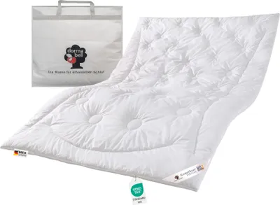 A white duvet and a white storage bag are displayed against a white background.