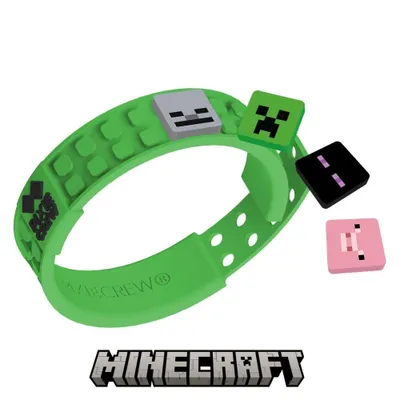 A green Minecraft-themed bracelet with detachable pixelated charms.