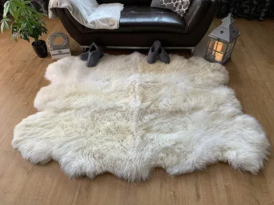 Produktbild von Sheepmania Sexto Lammfell Teppich Echt Ungeschoren - Dichtes Langhaar Schaffell Echt bis 10 cm - Schaffell Teppich Decke Kamin Lammfelldecke Kinderwagen - Weiß