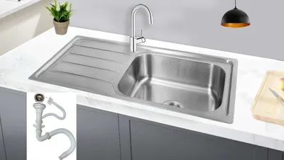 A stainless steel kitchen sink with a faucet and a drain assembly shown in a separate inset.