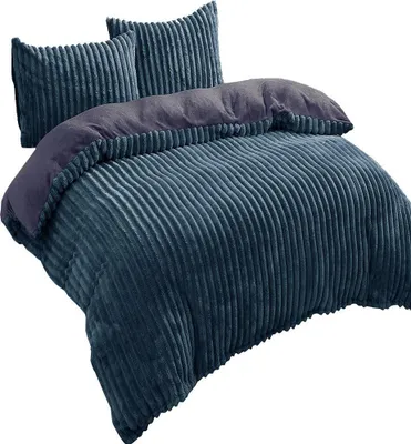 A dark blue teddy plush duvet cover and two pillowcases with a corduroy-like texture.