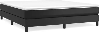 A black boxspring bed frame with a white mattress topper, shown from a side angle on a white background.