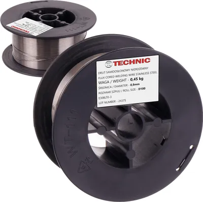 Two spools of flux-cored welding wire are shown, with one in the foreground and another in the background.